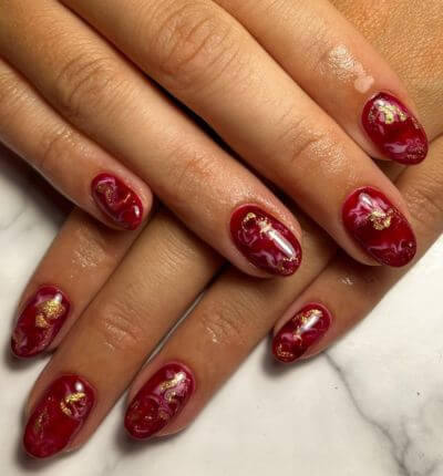 Gold and Red Marble nails